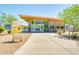 Modern tennis center featuring a sleek architectural design, large glass windows, and inviting entryway at 6226 N 21St Dr, Phoenix, AZ 85015