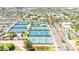Aerial view of a community with numerous well-maintained blue tennis courts and ample parking at 6226 N 21St Dr, Phoenix, AZ 85015