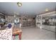 Spacious dining area with tile floors, decorative chair rail, and a bar area enhances the living space at 635 W Gable Ave, Mesa, AZ 85210