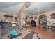 Open living room featuring wood floors, comfortable seating, and abundant natural light at 635 W Gable Ave, Mesa, AZ 85210