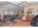 Inviting living space with wood-look flooring, comfortable furniture, and an open layout at 635 W Gable Ave, Mesa, AZ 85210
