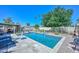 Refreshing pool surrounded by a tile patio and fence, perfect for a relaxing dip on hot summer days at 635 W Gable Ave, Mesa, AZ 85210
