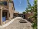 Low maintenance backyard with gravel and a small garden bed, perfect for outdoor entertaining at 6422 W Range Mule Dr, Phoenix, AZ 85083