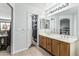 Bathroom with double sinks and a closet at 6422 W Range Mule Dr, Phoenix, AZ 85083