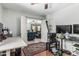 Spacious bedroom with wood floors and multiple doorways creates a sense of openness and flow at 6422 W Range Mule Dr, Phoenix, AZ 85083