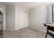 Bedroom featuring neutral walls, carpet, ceiling fan, and a closet at 6422 W Range Mule Dr, Phoenix, AZ 85083