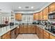Beautiful kitchen with stainless steel appliances, breakfast bar, and ample counter space at 6422 W Range Mule Dr, Phoenix, AZ 85083