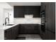 Modern kitchen featuring dark wood cabinets and marble countertops at 7167 E Rancho Vista Dr # 4010, Scottsdale, AZ 85251