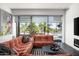 Open living room featuring a comfortable sectional couch and lots of natural light at 7167 E Rancho Vista Dr # 4010, Scottsdale, AZ 85251