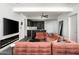 Open-concept living space with sleek finishes, comfortable seating, and modern appliances at 7167 E Rancho Vista Dr # 4010, Scottsdale, AZ 85251