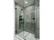 Glass enclosed shower features matte black hardware and gray tiled walls at 7167 E Rancho Vista Dr # 4010, Scottsdale, AZ 85251