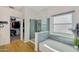Bathroom featuring glass-enclosed shower, soaking tub, and a walk-in closet at 824 W Mesquite St, Gilbert, AZ 85233