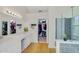 Bright bathroom featuring double sinks, walk-in closet, and glass door shower at 824 W Mesquite St, Gilbert, AZ 85233