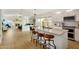 Bright, open kitchen featuring granite countertops, stainless appliances, and inviting seating at the island at 824 W Mesquite St, Gilbert, AZ 85233
