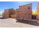 Charming townhomes with private garages, featuring well-kept facades and convenient parking access at 8244 W Albeniz Pl, Phoenix, AZ 85043