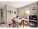 Eat in kitchen area with bright light coming through a large window at 8244 W Albeniz Pl, Phoenix, AZ 85043