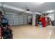 Spacious three car garage with ample storage and organization opportunities at 9052 E Hobart St, Mesa, AZ 85207