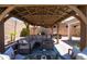 Relaxing backyard gazebo featuring comfortable lounge seating and stylish decor at 9052 E Hobart St, Mesa, AZ 85207