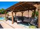Relaxing outdoor gazebo features comfortable seating and stylish decor at 9052 E Hobart St, Mesa, AZ 85207