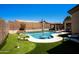 Inviting backyard pool and patio area, perfect for entertaining and relaxation at 9052 E Hobart St, Mesa, AZ 85207