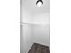 A walk in closet with shelving and carpet at 10828 N Biltmore Dr # 230, Phoenix, AZ 85029