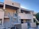 Inviting condo complex featuring well-maintained exteriors and convenient stair access at 10828 N Biltmore Dr # 230, Phoenix, AZ 85029