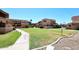 Well-maintained grounds with lush lawns and walkways, offering a serene environment at 10828 N Biltmore Dr # 230, Phoenix, AZ 85029