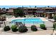 Community pool featuring a fenced area and lounge chairs for resident's enjoyment at 10828 N Biltmore Dr # 230, Phoenix, AZ 85029