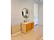 Inviting entryway with stylish console table, round mirror, and modern decor at 11074 W Tonto St, Avondale, AZ 85323