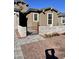 Landscaped front yard with brick accents, stone retaining wall and walkway lead to this lovely home at 11074 W Tonto St, Avondale, AZ 85323
