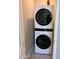 Modern LG Thinq washer and dryer unit, stacked for space efficiency, with sleek black and white design at 11074 W Tonto St, Avondale, AZ 85323