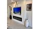 Contemporary living room featuring a modern fireplace and stylish decor adds a touch of elegance at 11074 W Tonto St, Avondale, AZ 85323