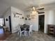 Cozy dining area featuring a modern table with seating for four and stylish decor at 11596 W Sierra Dawn Blvd # 33, Surprise, AZ 85378