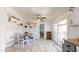 Charming dining room features a round table and chairs with a sliding glass door offering ample natural light at 11596 W Sierra Dawn Blvd # 33, Surprise, AZ 85378