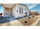 Well-maintained home featuring desert landscaping and a charming, enclosed front porch at 11596 W Sierra Dawn Blvd # 33, Surprise, AZ 85378