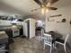 Open-concept kitchen with modern appliances and an adjacent dining area at 11596 W Sierra Dawn Blvd # 33, Surprise, AZ 85378