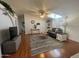 Open living area with hardwood floors, vaulted ceilings, and comfortable seating at 11596 W Sierra Dawn Blvd # 33, Surprise, AZ 85378