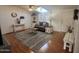 Bright living room with vaulted ceilings, hardwood floors, and stylish, comfortable seating at 11596 W Sierra Dawn Blvd # 33, Surprise, AZ 85378