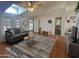 Inviting living room with vaulted ceilings, natural light, and modern furnishings at 11596 W Sierra Dawn Blvd # 33, Surprise, AZ 85378