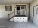 Covered porch with storage and stairs with rail at 11596 W Sierra Dawn Blvd # 33, Surprise, AZ 85378
