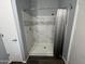 Modern shower with marble-look tile walls and a sleek silver shower curtain at 11596 W Sierra Dawn Blvd # 33, Surprise, AZ 85378