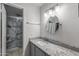 The primary bathroom features granite counters, a walk-in marble shower, and modern fixtures at 11666 N 28Th Dr # 295, Phoenix, AZ 85029