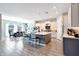 Gorgeous kitchen with stainless appliances, a center island, and modern pendant lighting at 11807 W Parkway Ln, Avondale, AZ 85323