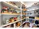 Well-organized pantry with ample shelving and storage space for food and household items at 11807 W Parkway Ln, Avondale, AZ 85323