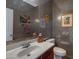Unique powder room with silver mosaic tile walls and an ornate vanity at 1281 E Frances Ln, Gilbert, AZ 85295