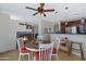 Cozy dining area featuring a fireplace and a round table with seating for four at 1281 E Frances Ln, Gilbert, AZ 85295