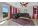 Cozy living room featuring hardwood floors, stylish furniture, and views of the outdoors at 1281 E Frances Ln, Gilbert, AZ 85295