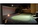 Night view of putting green featuring lush landscaping creating a private recreational space at 13686 N 151St Dr, Surprise, AZ 85379
