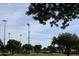 The community park provides open green spaces, sports fields, and mature trees for recreation and community engagement at 13686 N 151St Dr, Surprise, AZ 85379