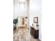 Grand foyer with high ceilings, tile flooring, and an elegant console table at 13686 N 151St Dr, Surprise, AZ 85379
